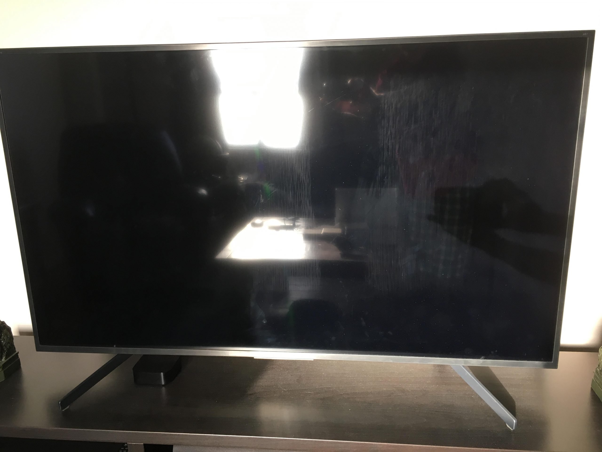 How can I properly clean my TV screen? See photo ...