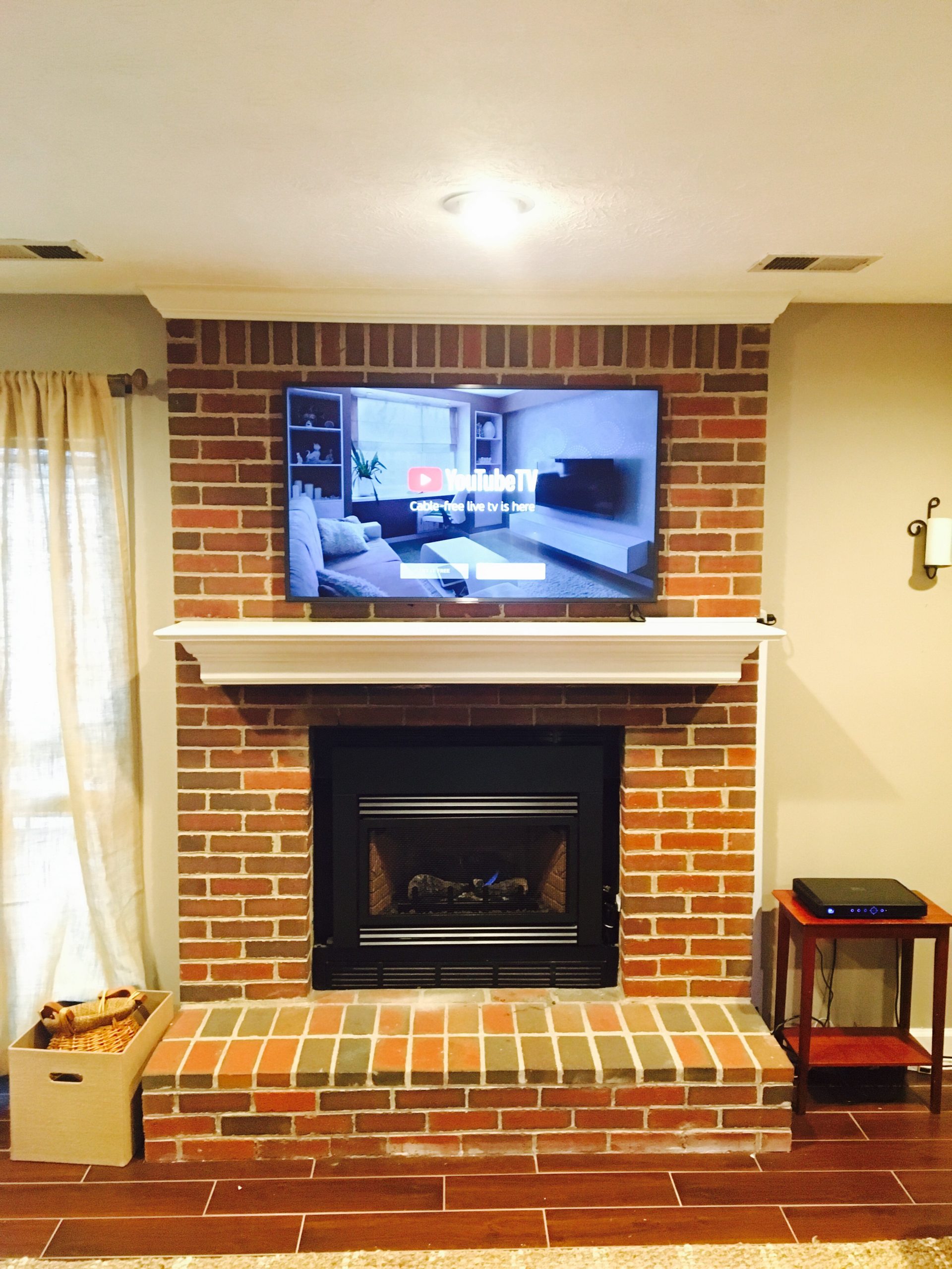 TV Mounted on a Brick Fireplace in Lexington, Kentucky ...